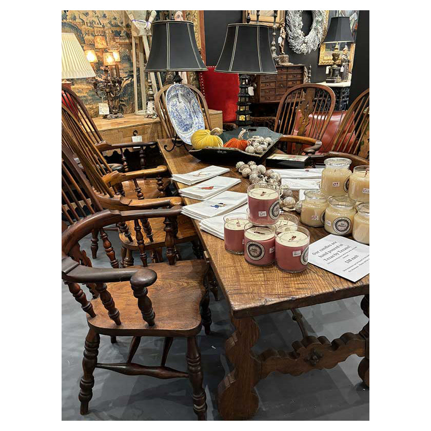 Holiday candles on rustic dining table